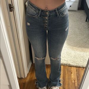 Buckle Boot Cut Jeans with Distressed Details